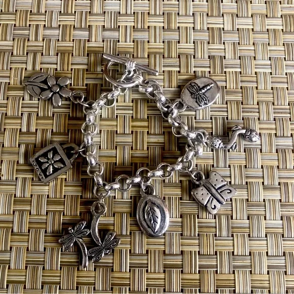 Cute Little Charm Bracelet with 7 charms including flowers , ladybug, butterfly - Picture 1 of 7
